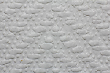 Closeup artificial leather white colour for texture background. top view.