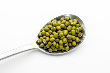 mung beans in a steel spoon