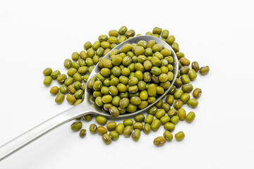 mung beans in a steel spoon