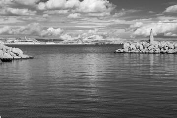The picturesque fishing port of Larnaca, Cyprus, where colorful boats sway gently in the harbor, reflecting the timeless charm of Mediterranean coastal life