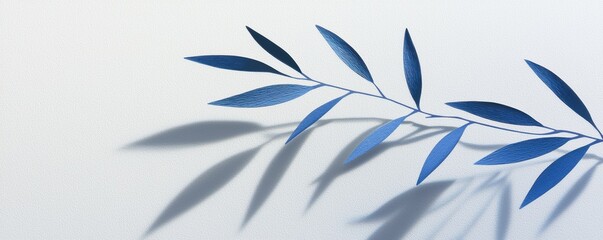 Elegant Blue Leaves with Shadows on a Light Background for Artistic Use
