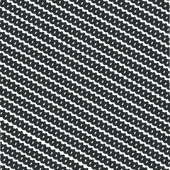 WebThick diagonal chains create texture.