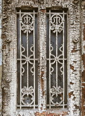 The texture of the wood. Cracked paint on old vintage door detail. 