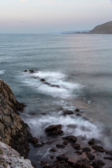 Waves crashing on the rocks on a moody summer night. Barents Sea, Belrvåg, Finnmark