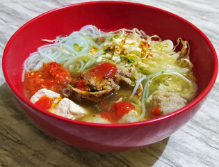 Bakso. Bakso is a very popular food in Indonesia, can be served with tofu and beef bones. Bakso is made from minced beef or chicken mixed with tapioca flour, garlic, and other ingredients.