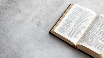 Obraz premium Open dictionary on white surface