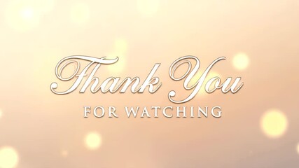 Thank you for watching message on a soft, glowing beige background with bokeh lights, perfect for video outros and ending screens