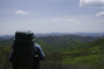Hiker Enjoying Scenic Mountain Landscape