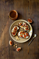 Fig sandwiches with cheese and honey for breakfast. Top view