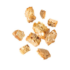 Tasty cookies with almond nuts in air on white background. Traditional Italian Cantuccini