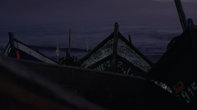 Fishing boats in a harbour, evening sunset scene, Morocco