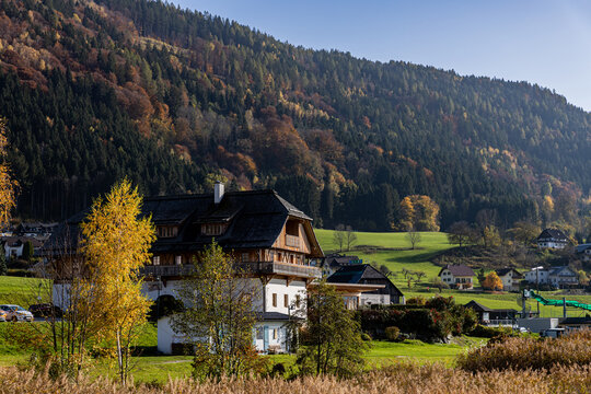 Austrian lake Ossiacher See in Carinthia with the village of Ossiach and the Alps in the background in autumn
