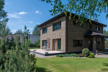 Modern luxury villa exterior in minimal scandinavian style, 3d render
