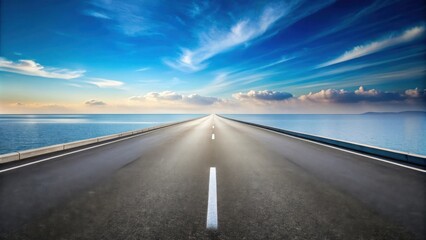 Fototapeta premium Asphalt road vanishing point towards a tranquil ocean under a vibrant sky