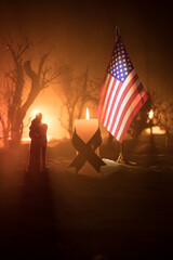 A tabletop diorama of a tragic California wildfire, set in Pacific Palisades near Malibu. Dramatic...