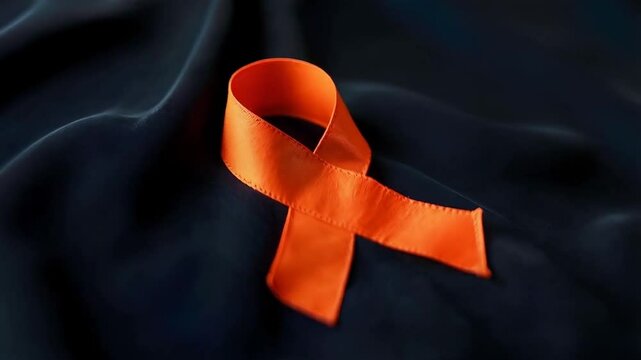 Orange ribbon representing awareness for multiple sclerosis, kidney cancer, and leukemia support