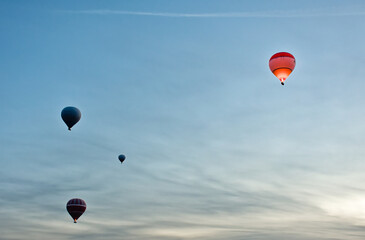 hot air balloons flying in the sky at cappadocia, nevsehir