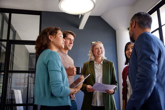 Friendly multiethnic business team discussion during a casual meeting