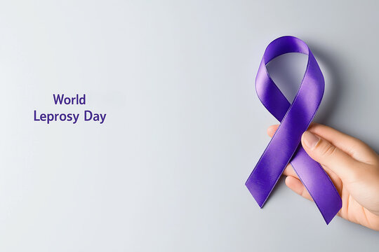 Hand holding purple awareness ribbon, neutral background, top view. World Leprosy Day banner