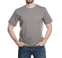 Man in blank grey t-shirt on white background, closeup. Mockup for design