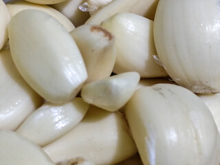 Peeled garlic. Garlic is a cooking spice ingredient.