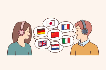 Two polyglots in headphones communicate in different languages, stand near country flags