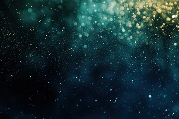 Obraz premium Abstract teal and gold bokeh lights on black background.