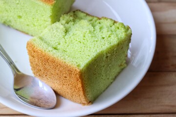 Sponge cake on wood background