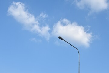 electric lamp pole on cloud and sky background