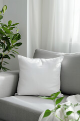 Modern Gray Sofa with Plush White Cushion in Bright Contemporary Living Room Interior Design Mockup for Home Decor Concept