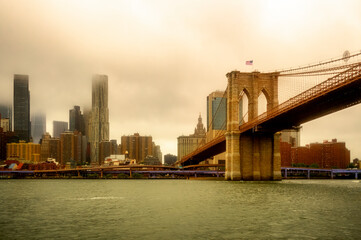 Fototapeta premium Apocalyptic View of Brooklyn Bridge and skyscrappers in New York City - USA