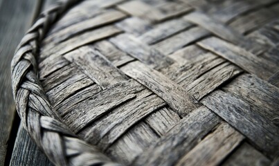 Fototapeta premium Close-up of rustic woven wooden tray on wooden surface, ideal for food presentation