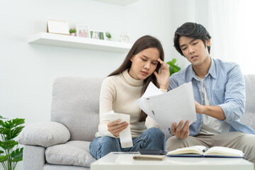 Family financial concept, Stressed wife and husband have a problem to pay loan can not pay credit...