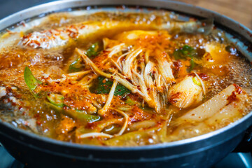 boiling fish stew in the pot
