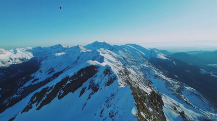 A mountainous terrain covered in snow, Alpine style, photo of