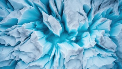 Fototapeta premium Abstract close-up of blue and white ice formation with textured patterns