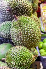 Fresh stinky durian fruits at the market