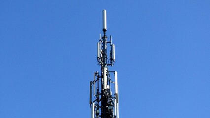 Telecommunication tower. Telecom tower antennas and satellite transmits the signals of cellular 5g 4g mobile signals to the consumers and smartphones.