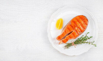 Grilled salmon fish steak on white background. roasted salmon steak Omega 3 product, top view
