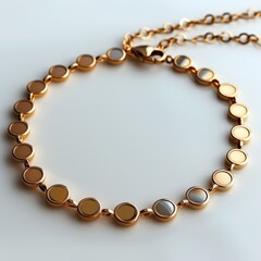 Fototapeta premium Mockup of a blank elegant gold bracelet with charms set against a white background, ideal for personalized jewelry, gift presentations, and luxury fashion accessories.