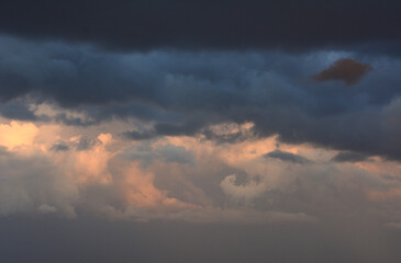 a stormy cloud isolated in the dark sky 