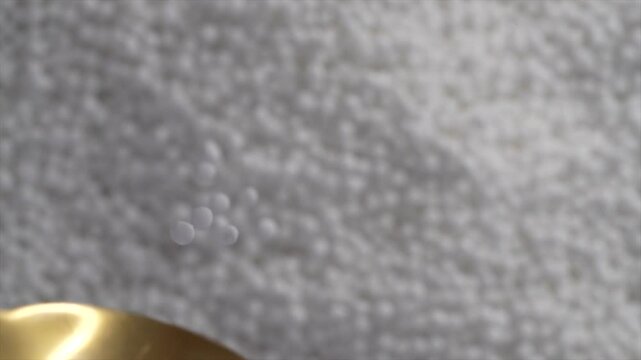 Macro video of tapioca pearl or sago on rotating disc. Close up video of Sabudana.