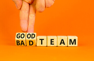 Good or bad team symbol. Concept words Good team Bad team on wooden cubes. Beautiful orange table...