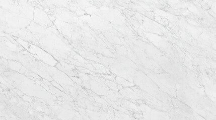 Elegant white marble displaying subtle cream veins and a polished finish perfect for luxurious backgrounds