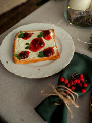 Berry jam sandwich on the New Year's table. Christmas lunch.