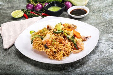 Asian cuisine - Fried noodles with seafood