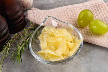 Parmesan cheese slices in the bowl