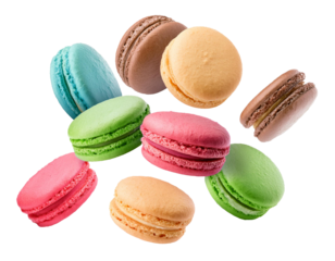 Falling macarons isolated on white background, cutout 