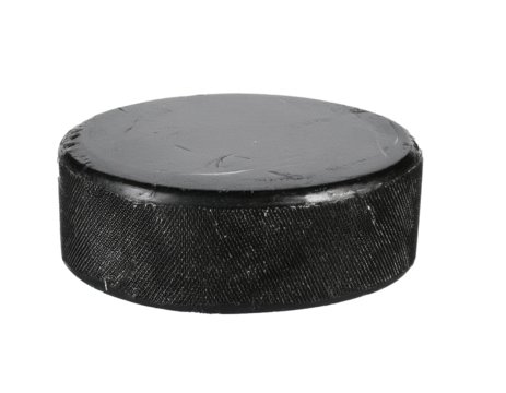 Ice hockey puck isolated on white background, cutout 