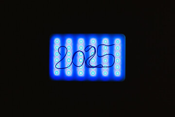 2025. A colored lamp with the number 2025